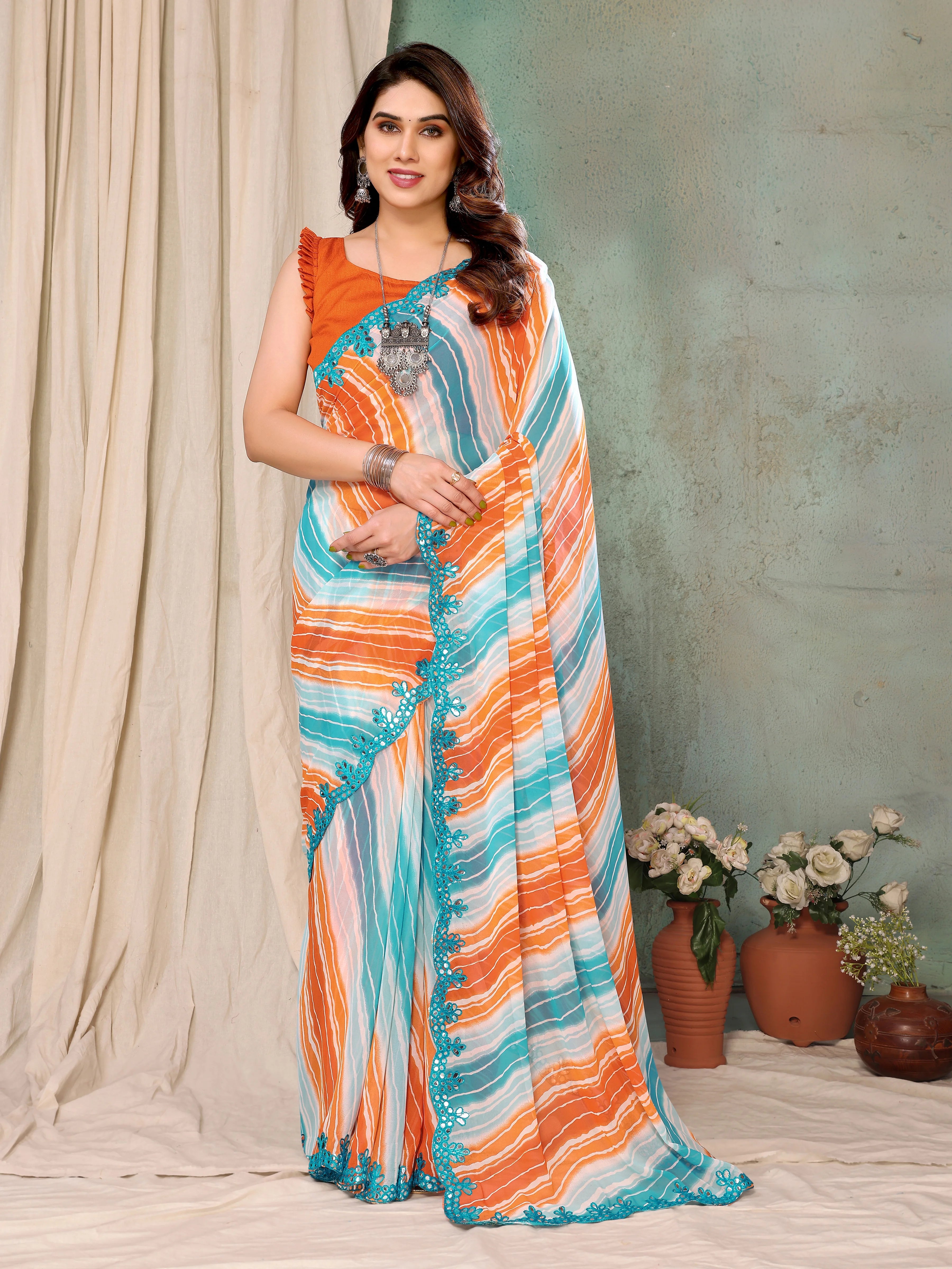 SHYAMIKA Georgette Orange Sky Tiger Printed Saree with Fancy Mirror Lace and Blouse